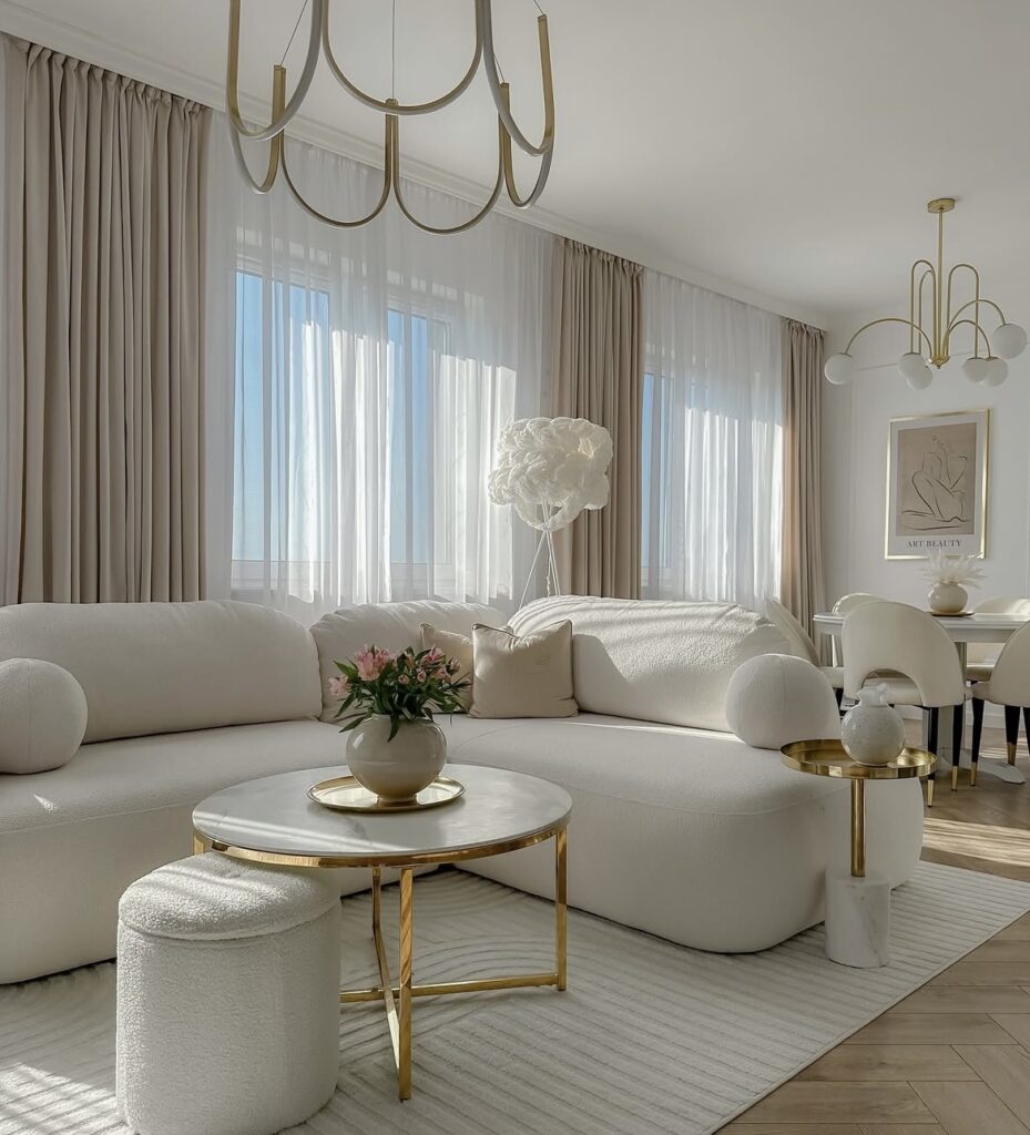 A modern living room with a gold coffee table.