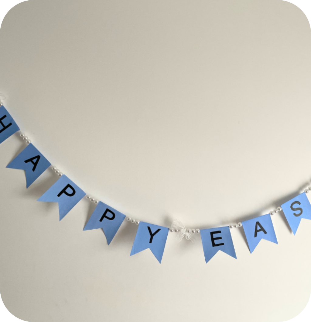 Easter garland with blue banners, fake pearls and lace ribbon bows. ©ASTRAPEARL - DO NOT USE