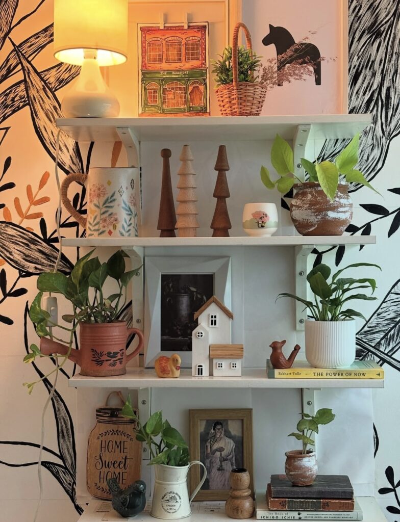 A shelf filled with figurines.