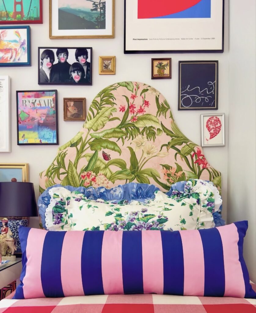 A floral headboard in a quirky bedroom.