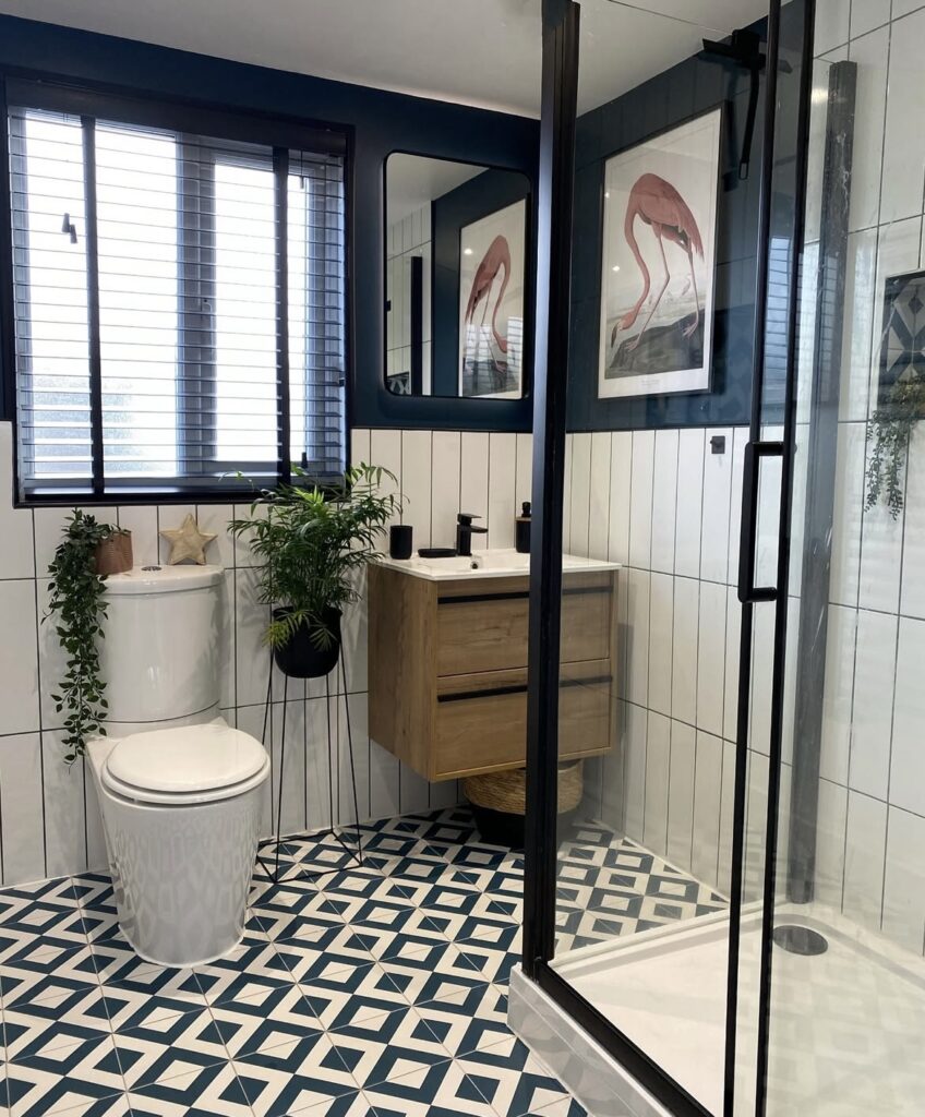 A modern bathroom with plants.