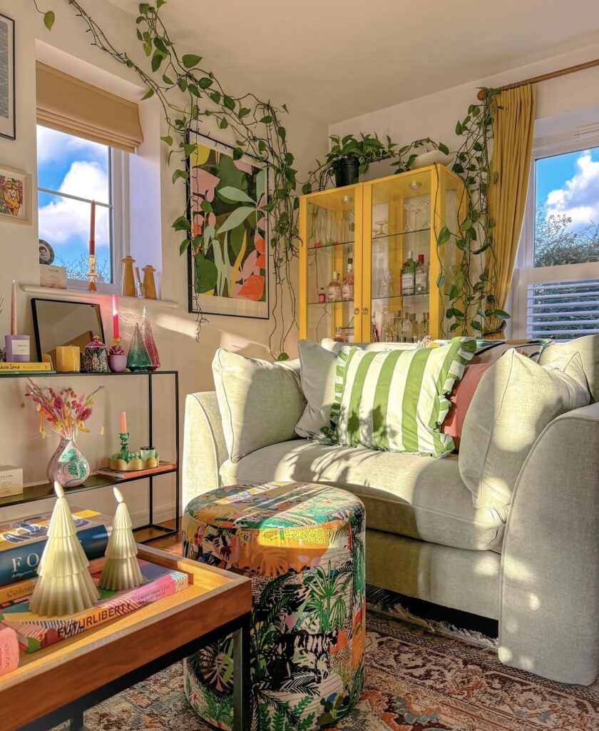 A yellow living room with plants.