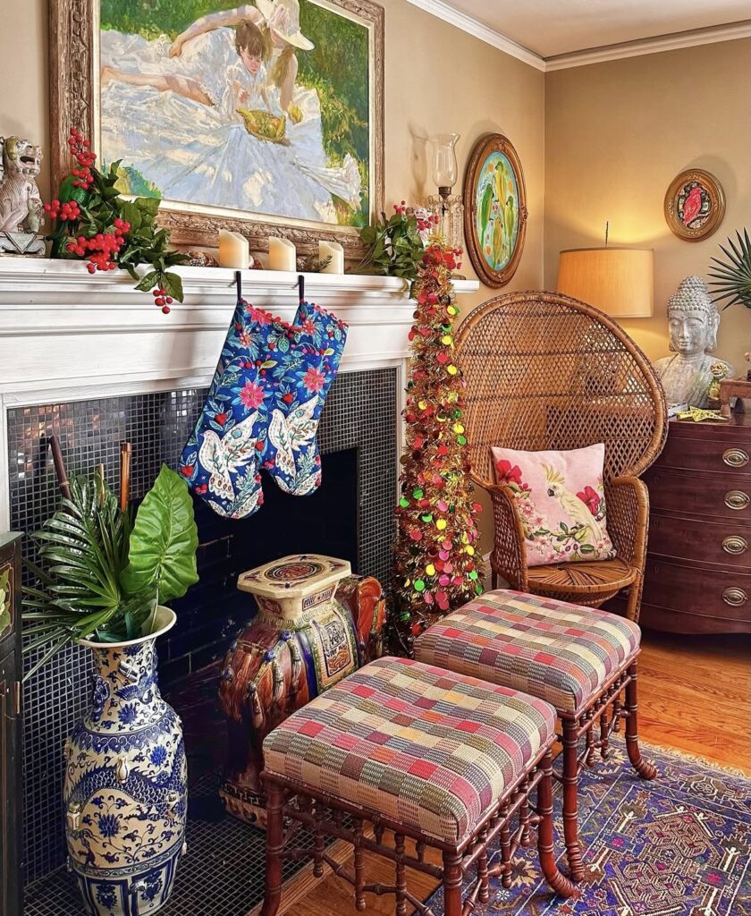A mantel with a vintage painting and patterned accessories.