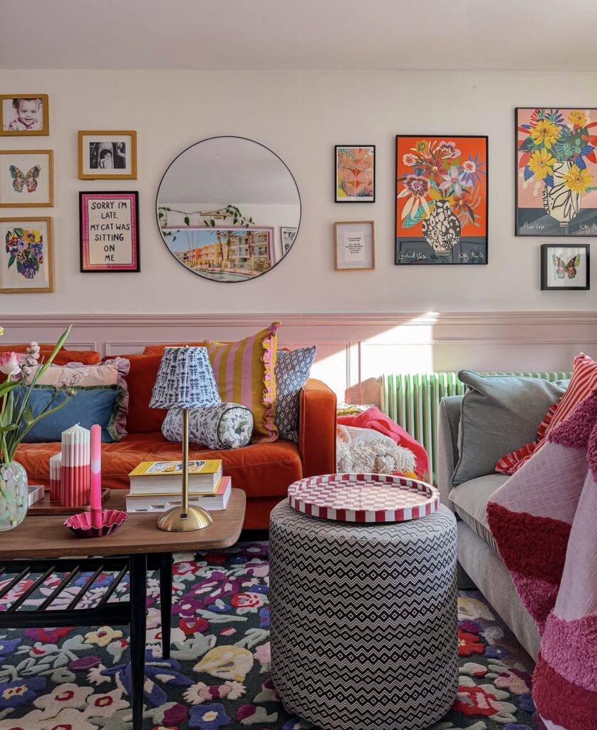 A pink living room with patterns.