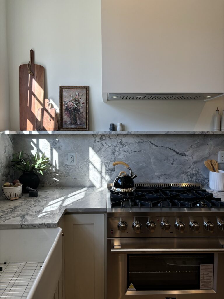 A kitchen with marble.