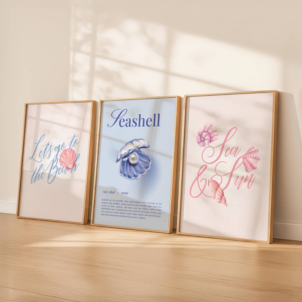 3 art prints depicting seashells and positive quotes with blue and pink shades in wooden frames.