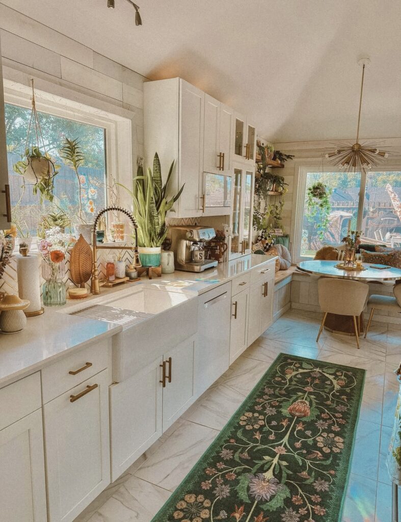 A white kitchen cabinet with a floral rug.