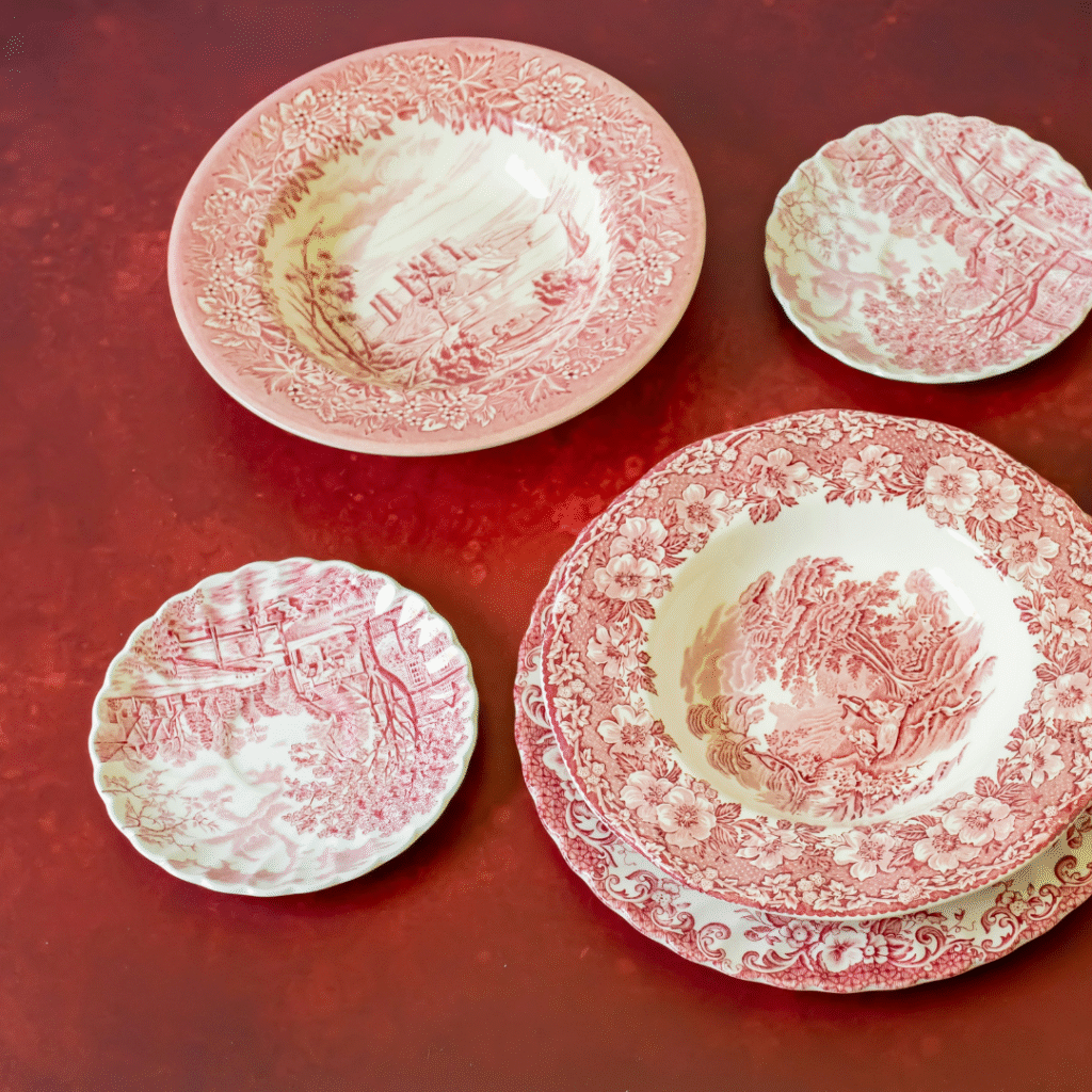 Antique pink patterned plates.