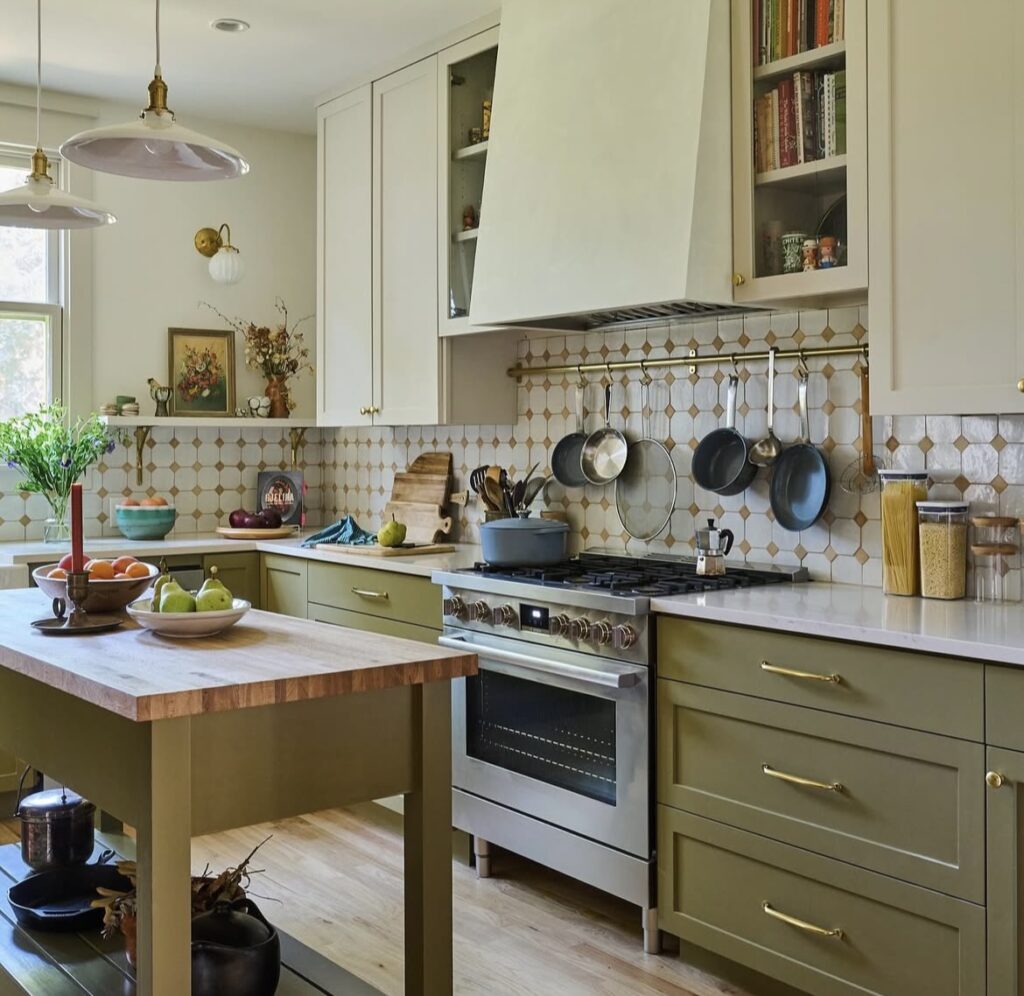 A sage green kitchen.