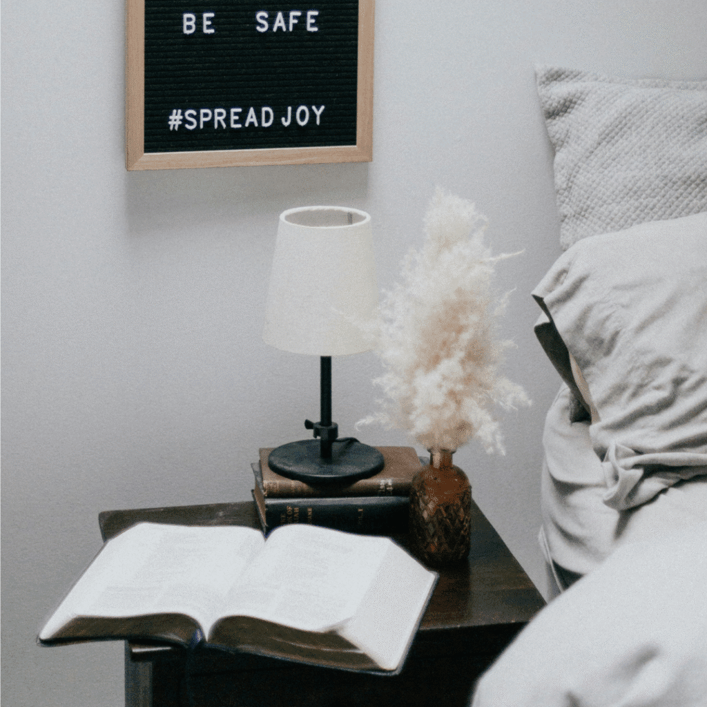 Books on a nightstand table.