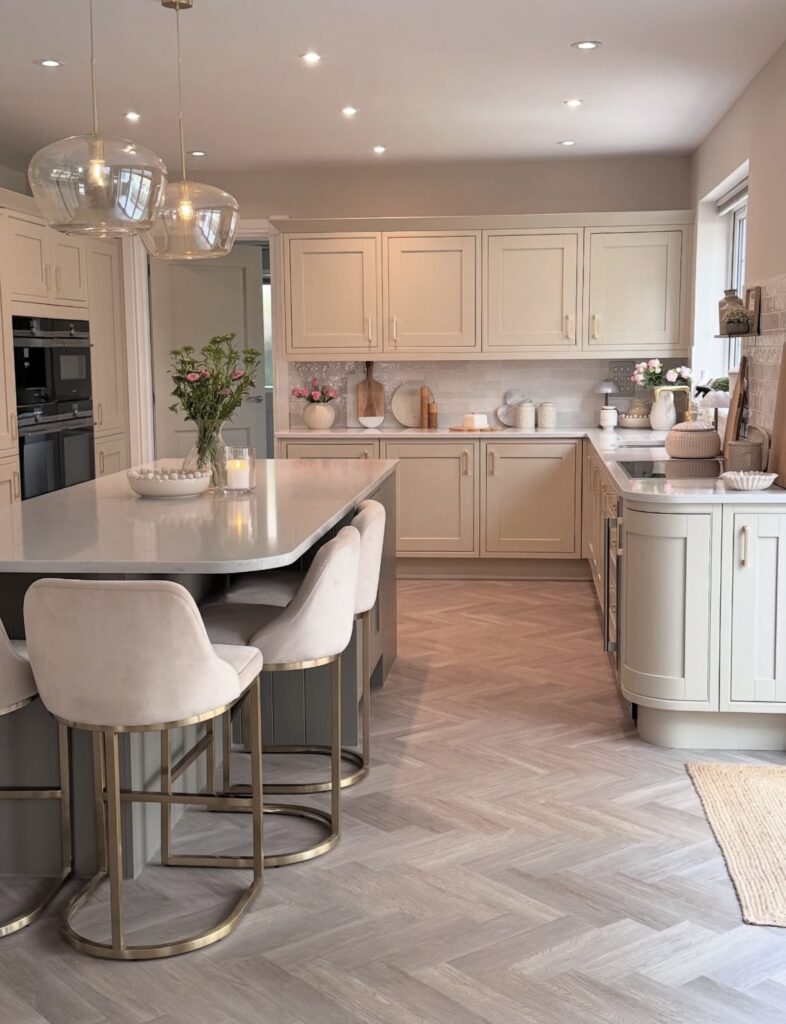 A white kitchen with modern accessories.