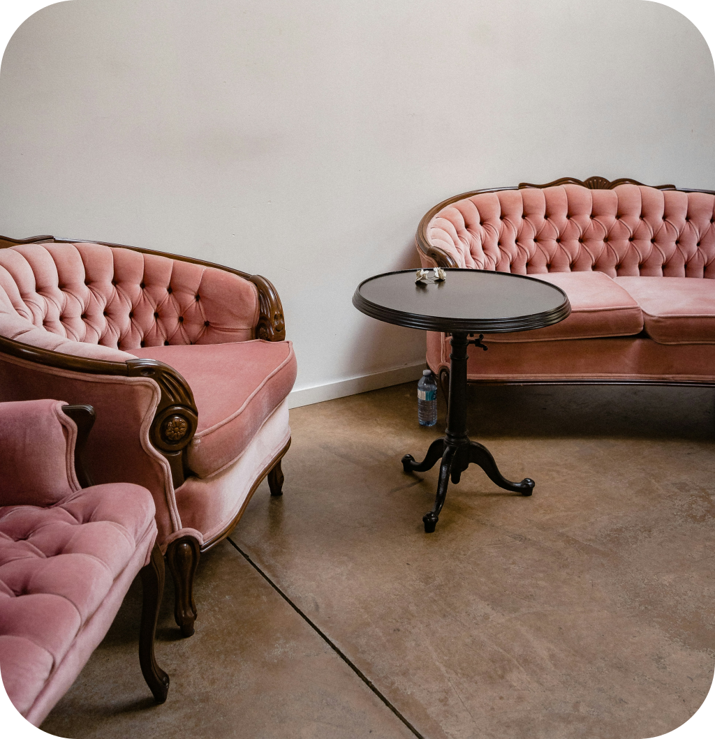 3 antique pink chairs.