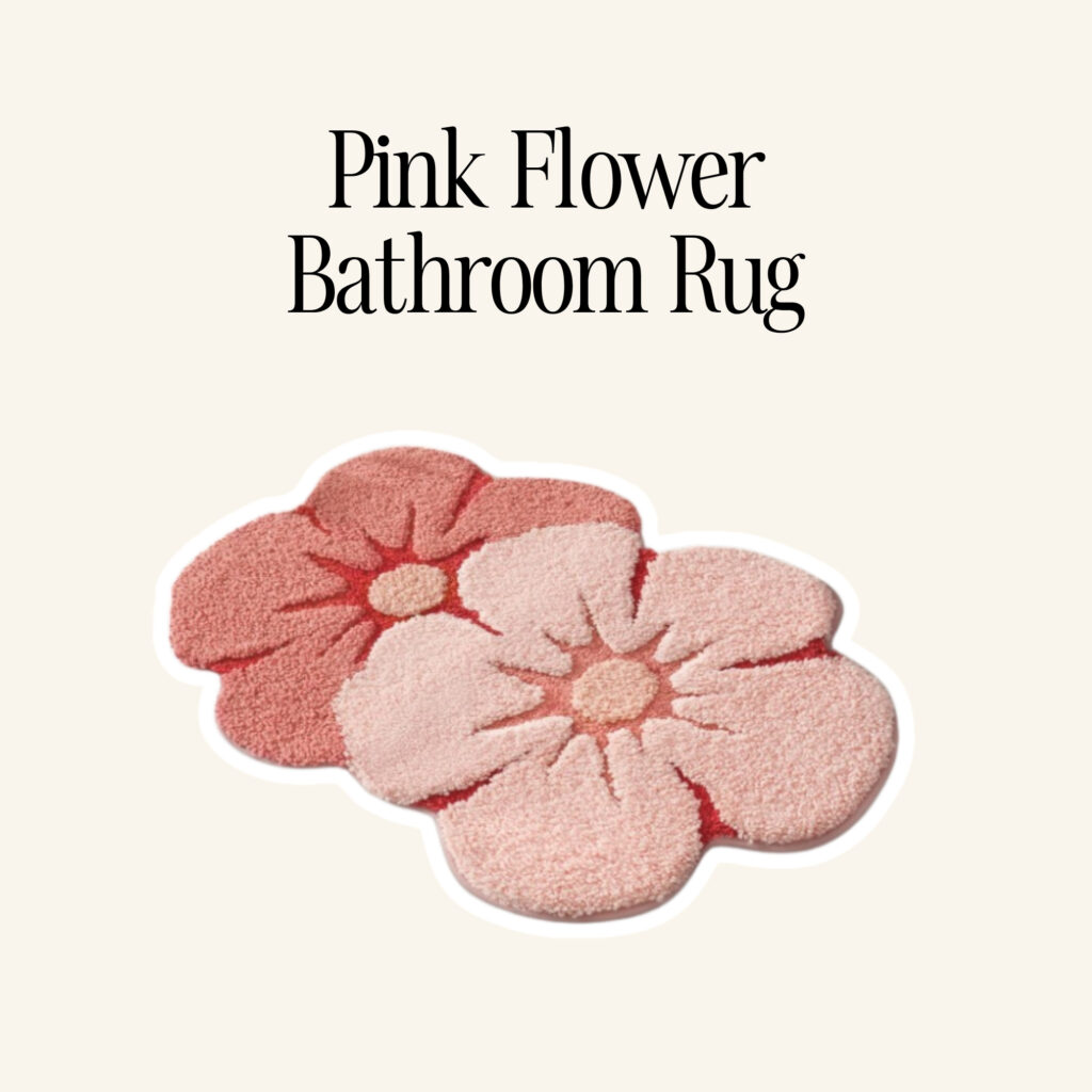 A pink flower bathroom rug.
