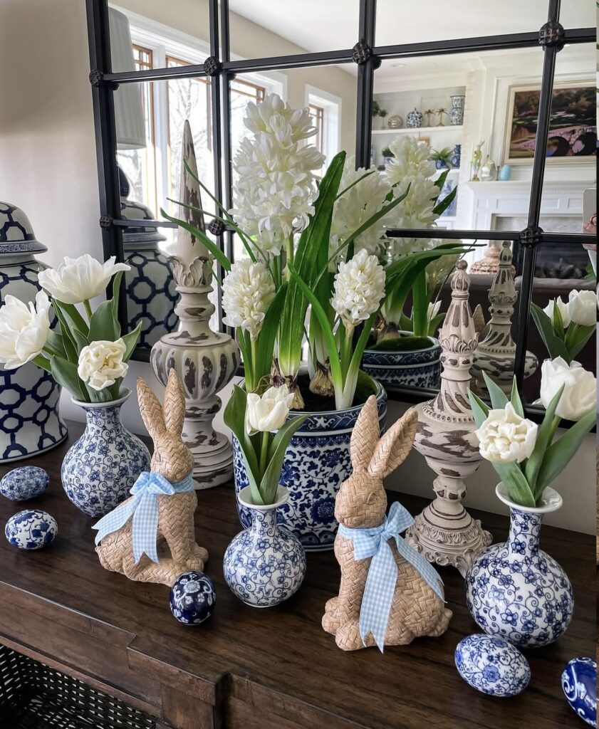 Woven bunny figurines with chinoiserie vases.