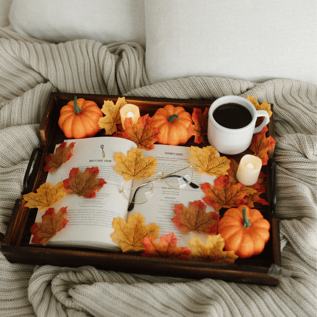 A fall tray on a bed.