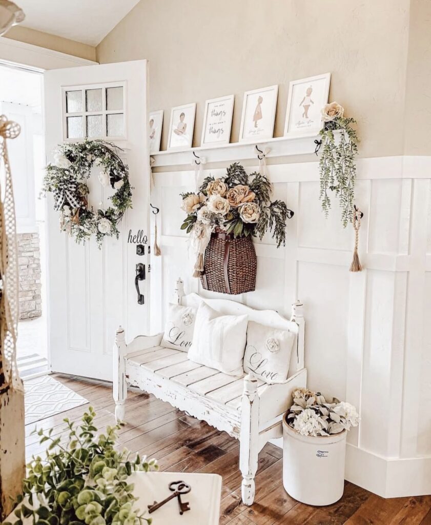 A farmhouse entryway with fresh flowers.