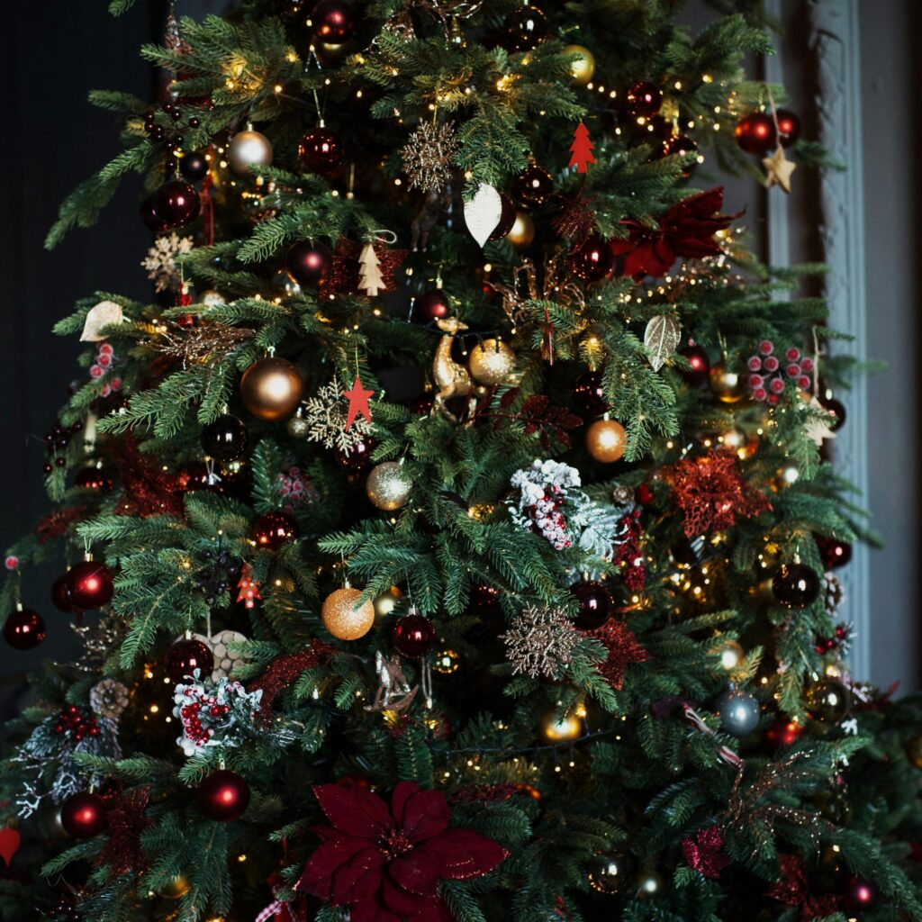 A Christmas tree with many ornaments.