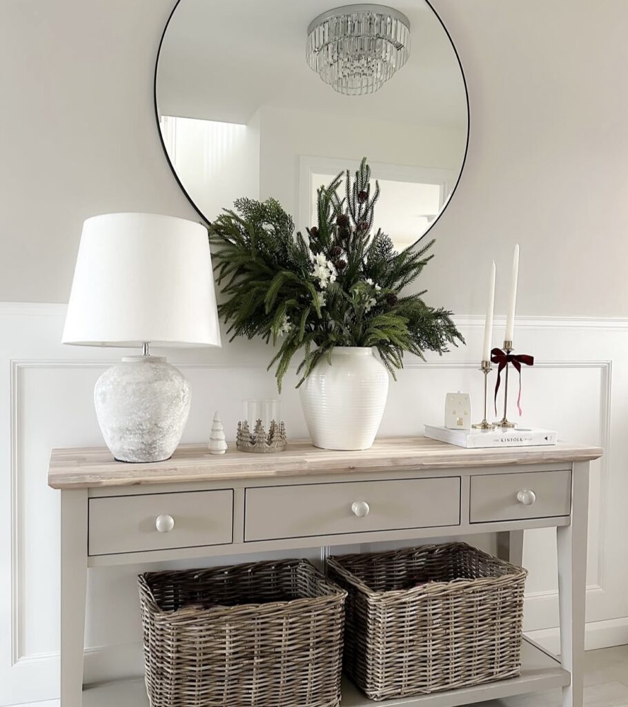 A neutral entryway with Christmas accessories.