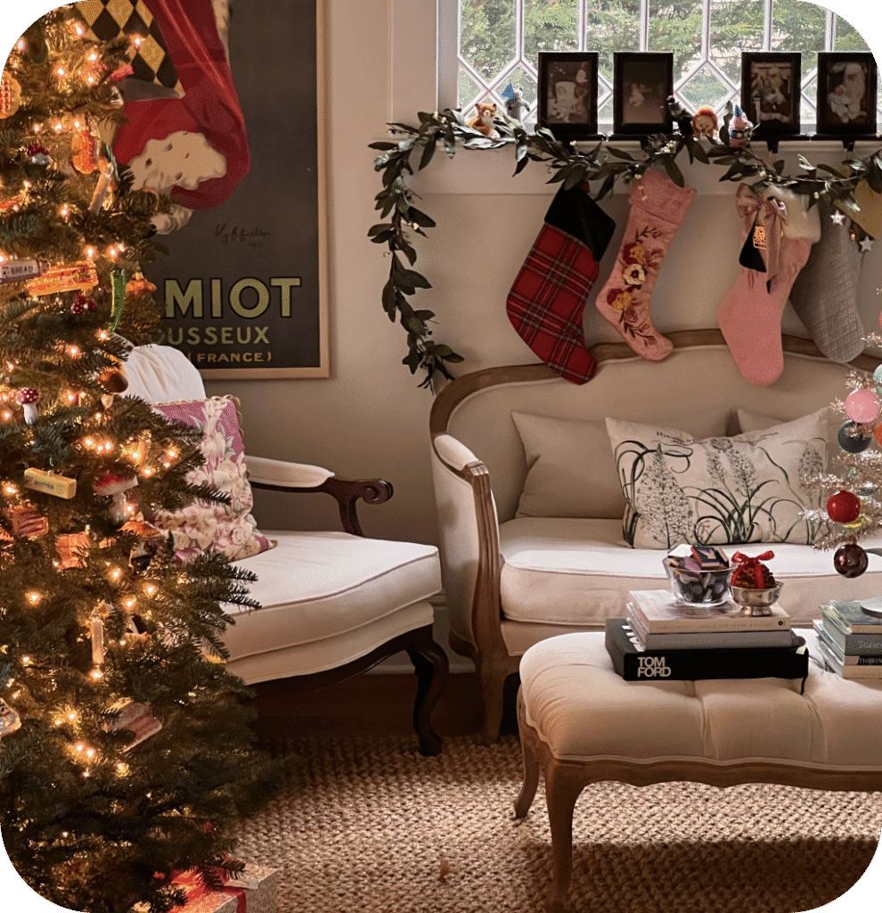 A Christmas living room with antique furniture.