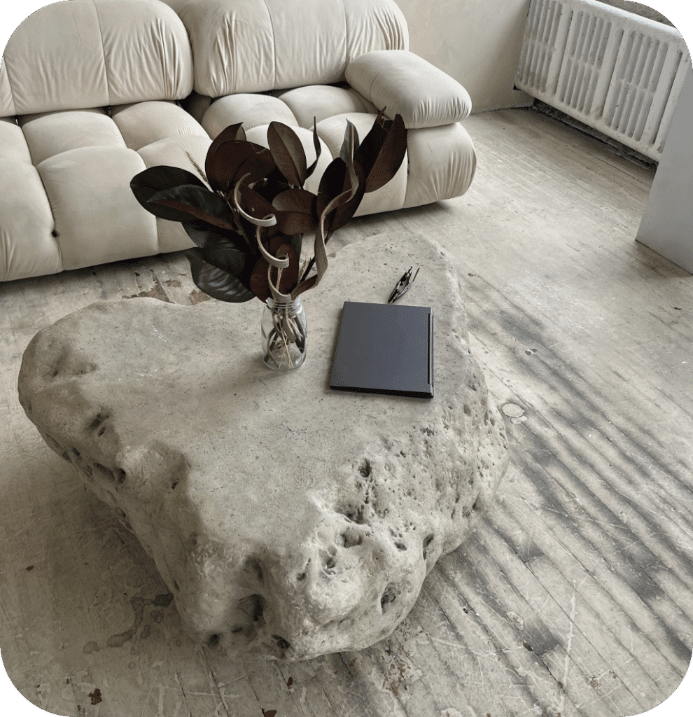 A stone coffee table in a modern living room.