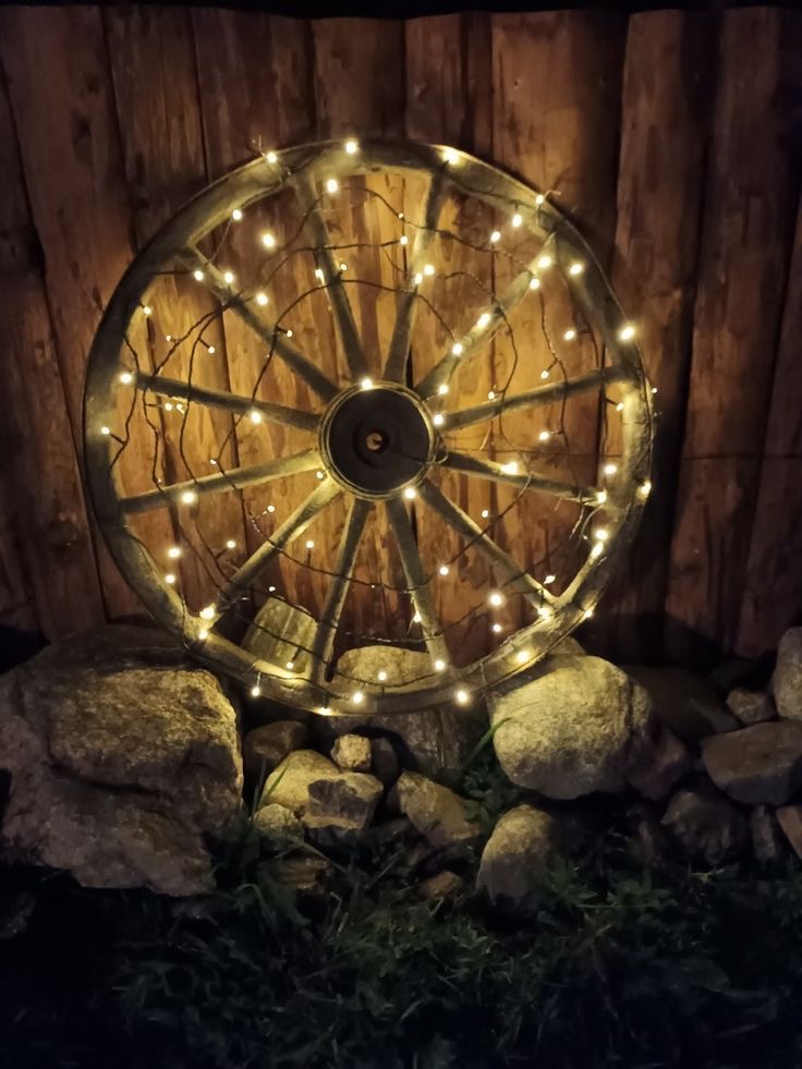 A wheel with string lights.