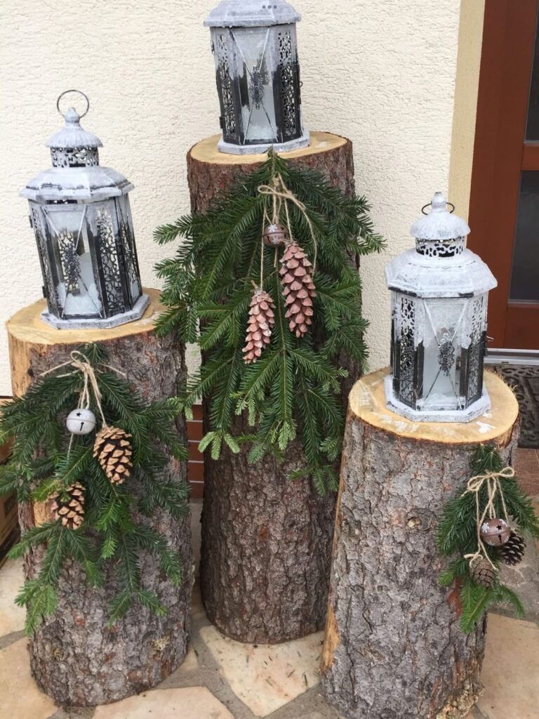 Wooden logs with candle lanterns.