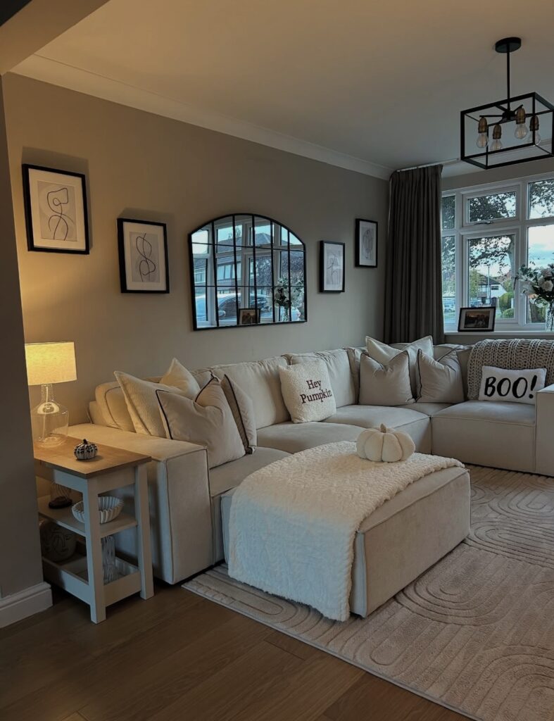 A living room with a mirror.