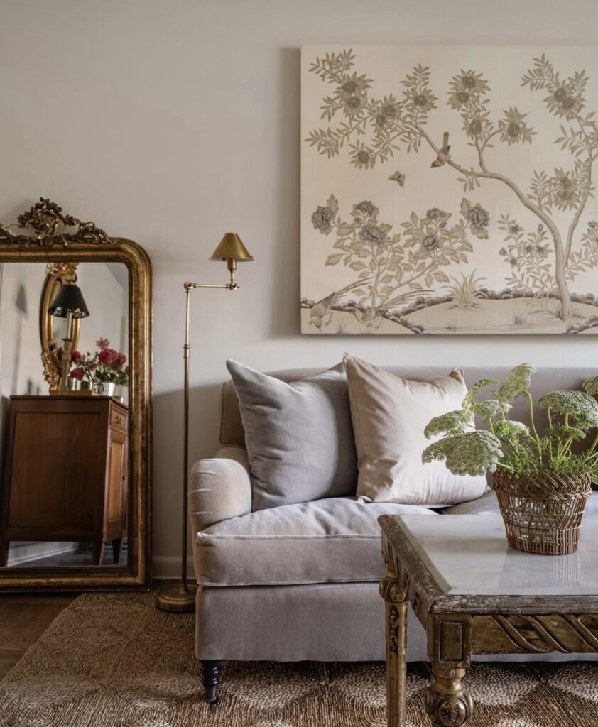 A living room with a mirror.