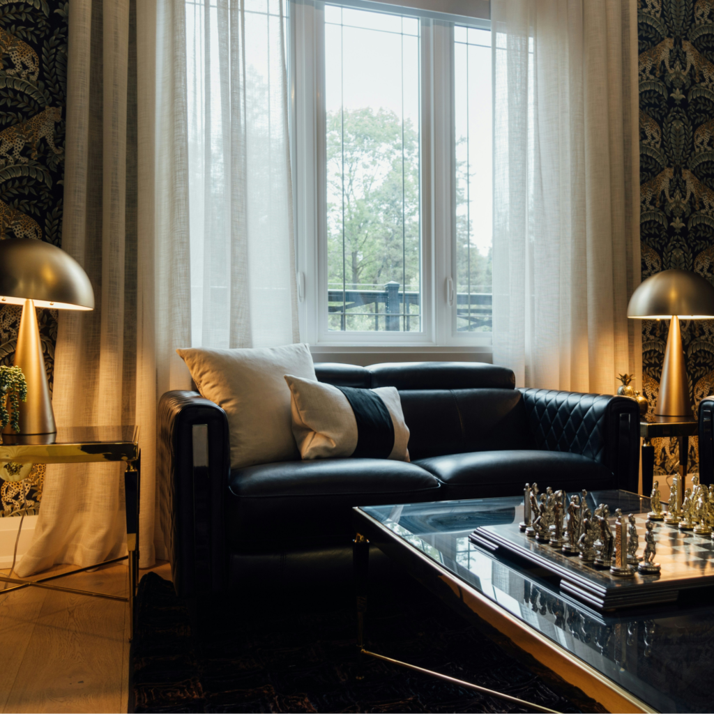 A living room with curtains.