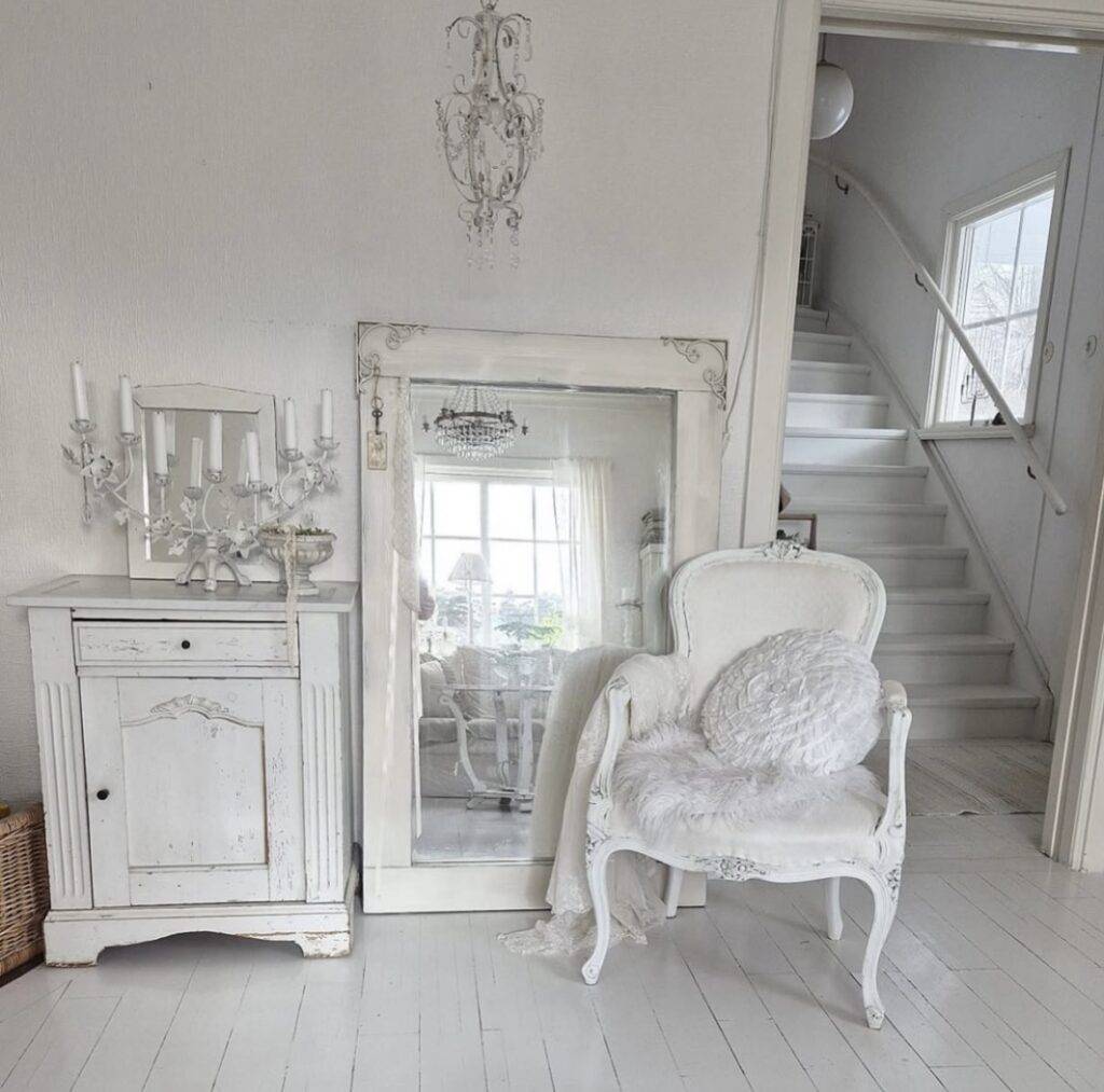 A living room with a mirror.