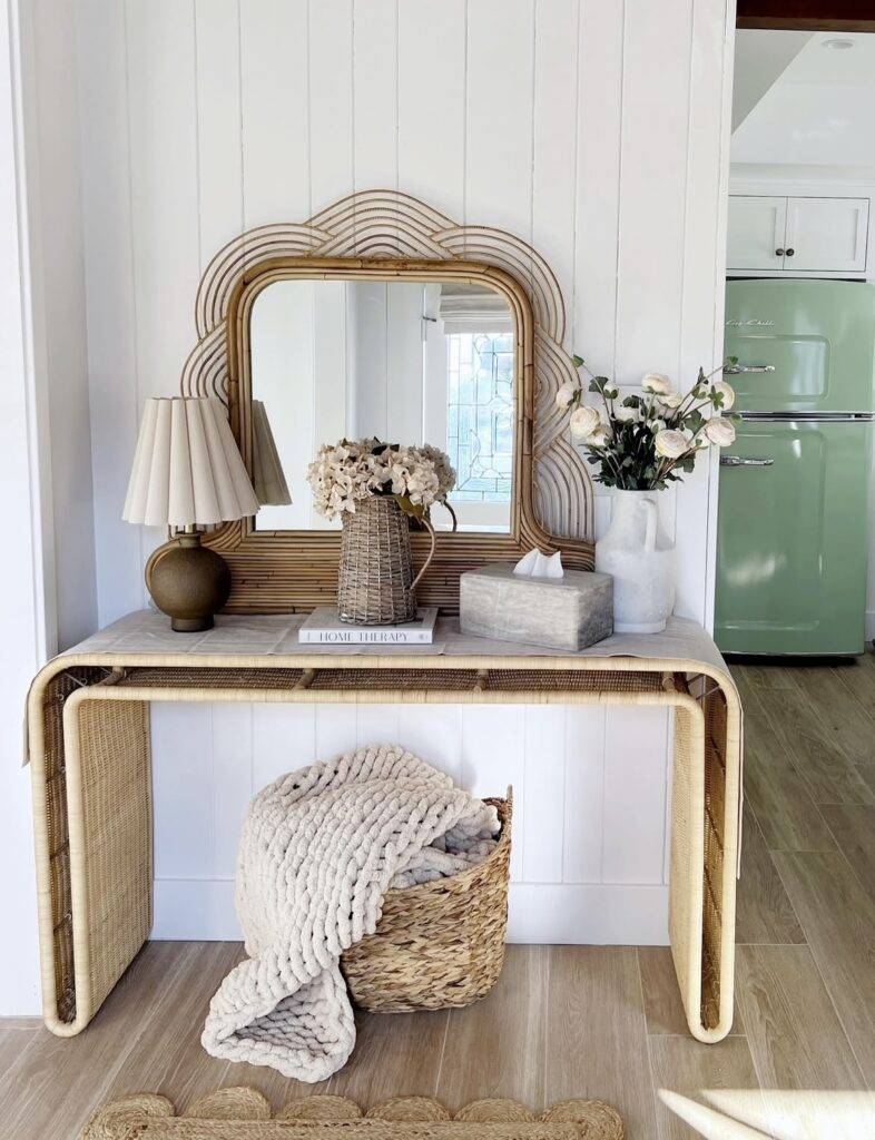 A living room with a mirror.