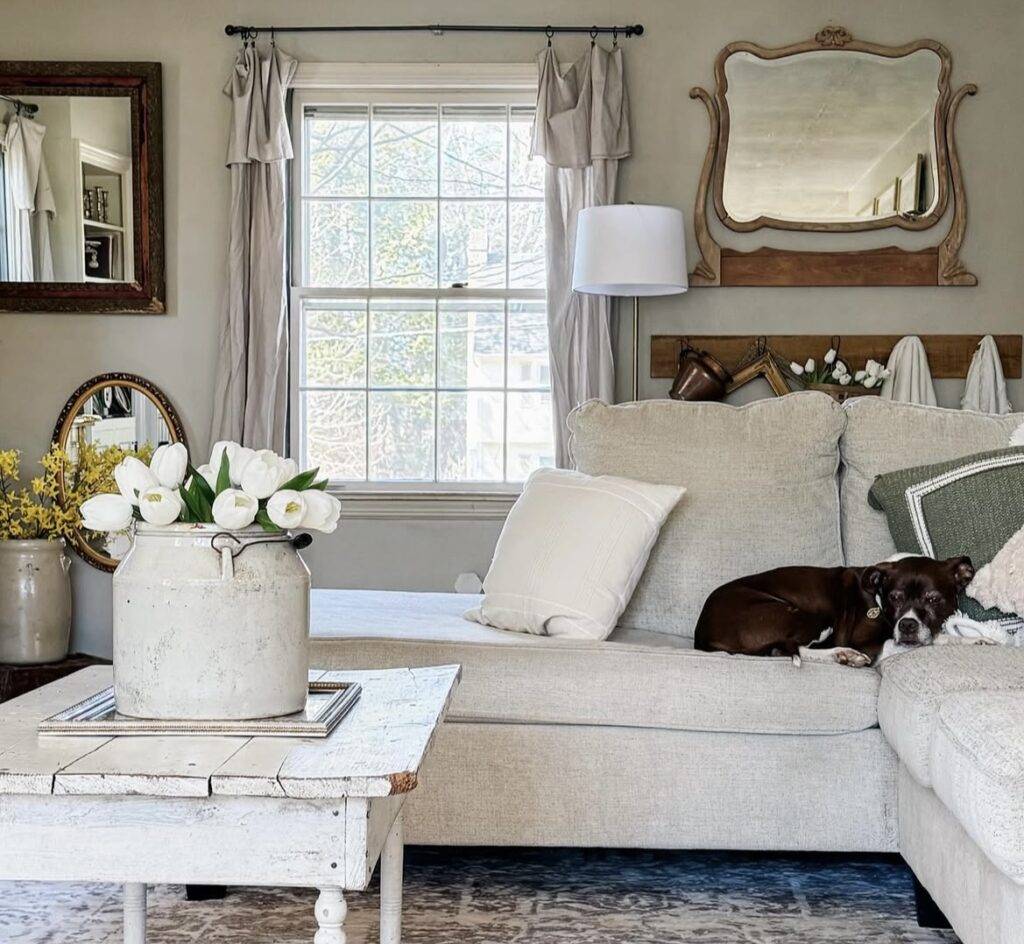 A living room with a mirror.