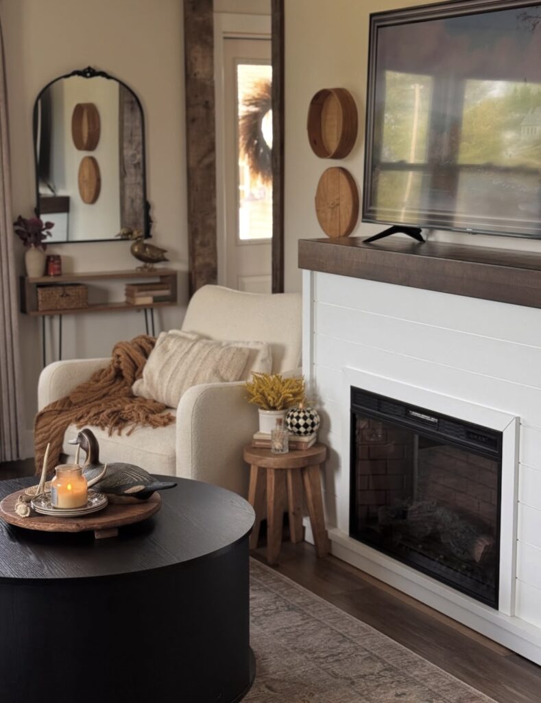 A living room with a mirror.