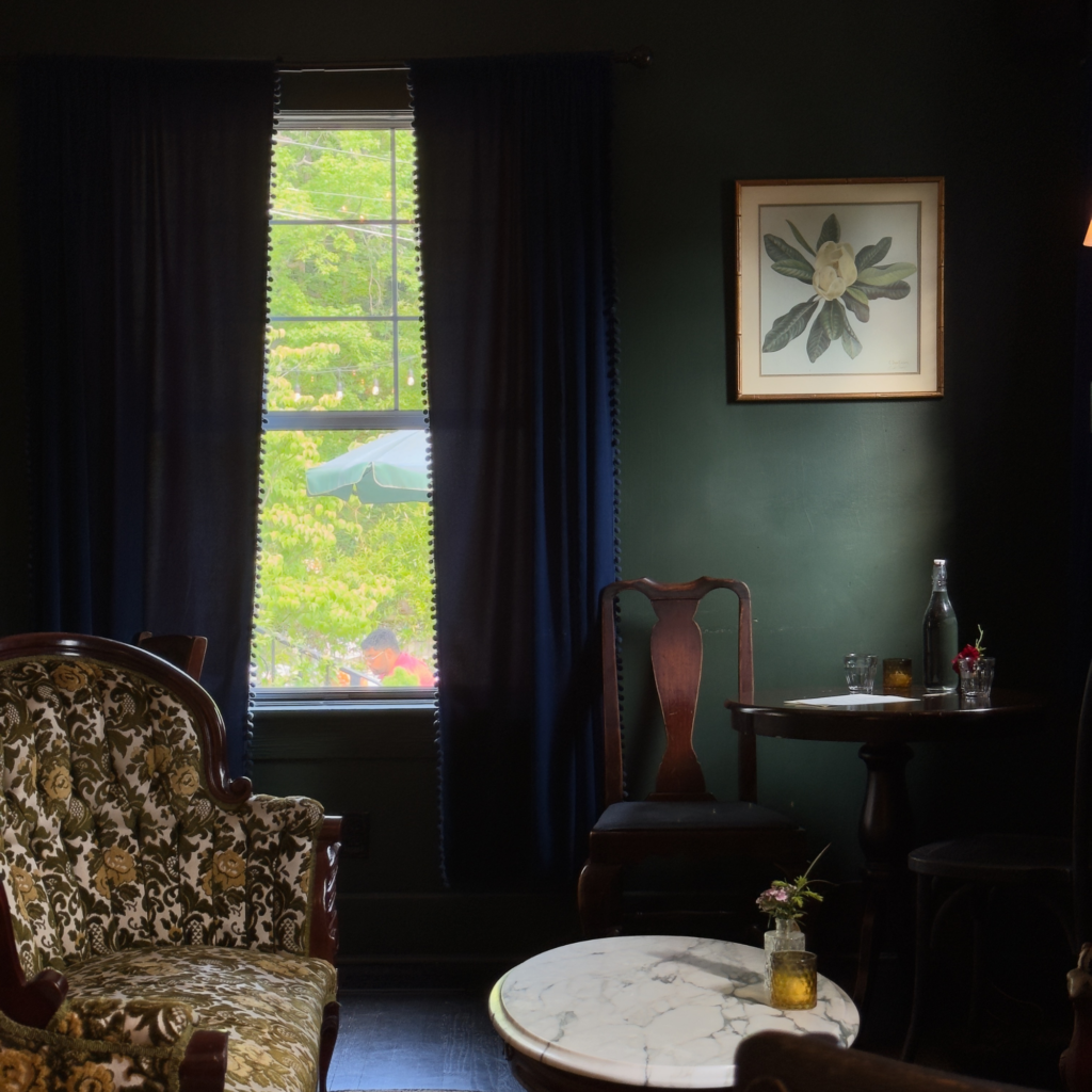 A living room with curtains.
