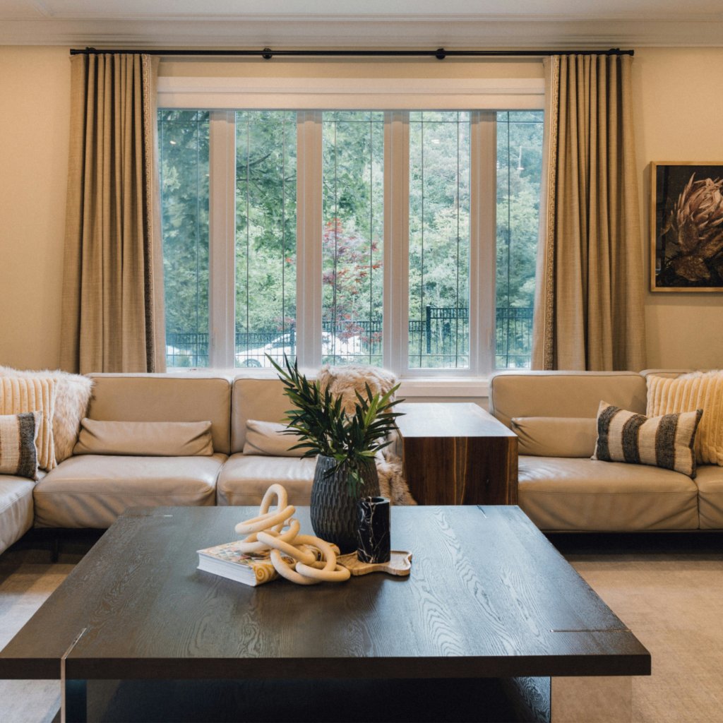 A living room with curtains.