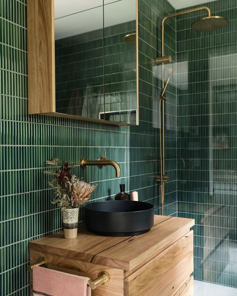 A mirror in a bathroom.