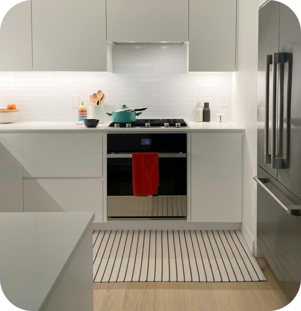 A modern kitchen rug.