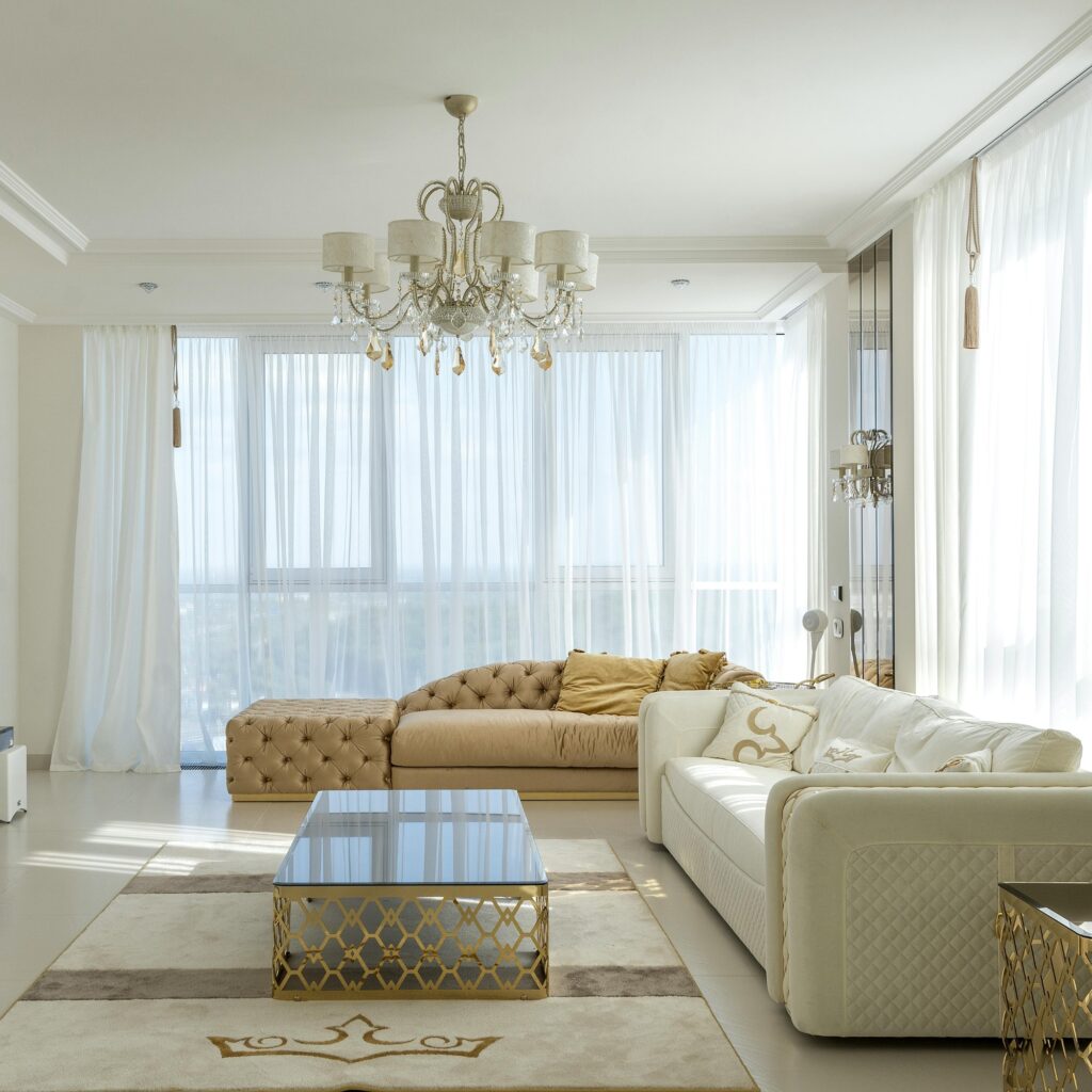 A living room with a rug.