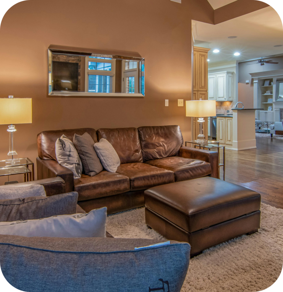 A living room with a rug.