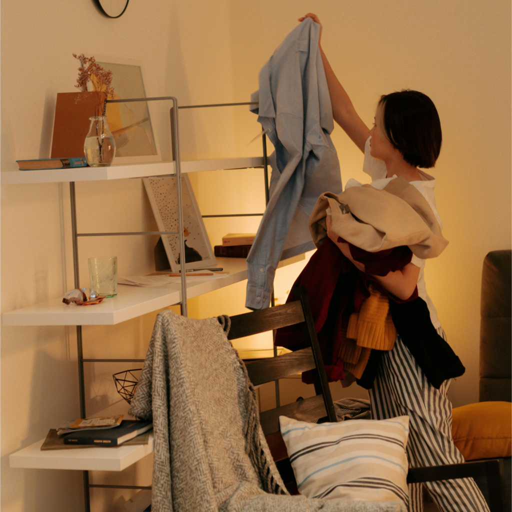 A woman decluttering.